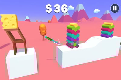 A screenshot of a game where a sword is being used to cut a stack of blocks.